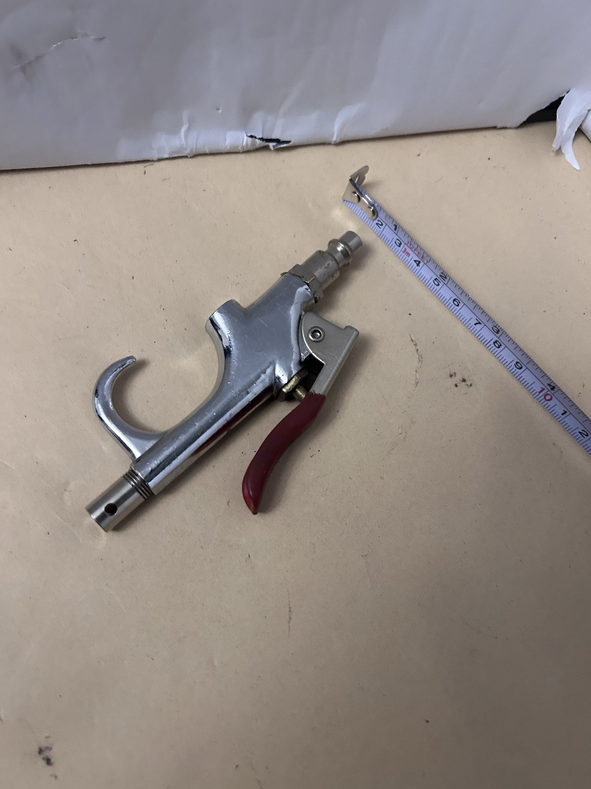 Unbranded untested pneumatic air gun with red handle