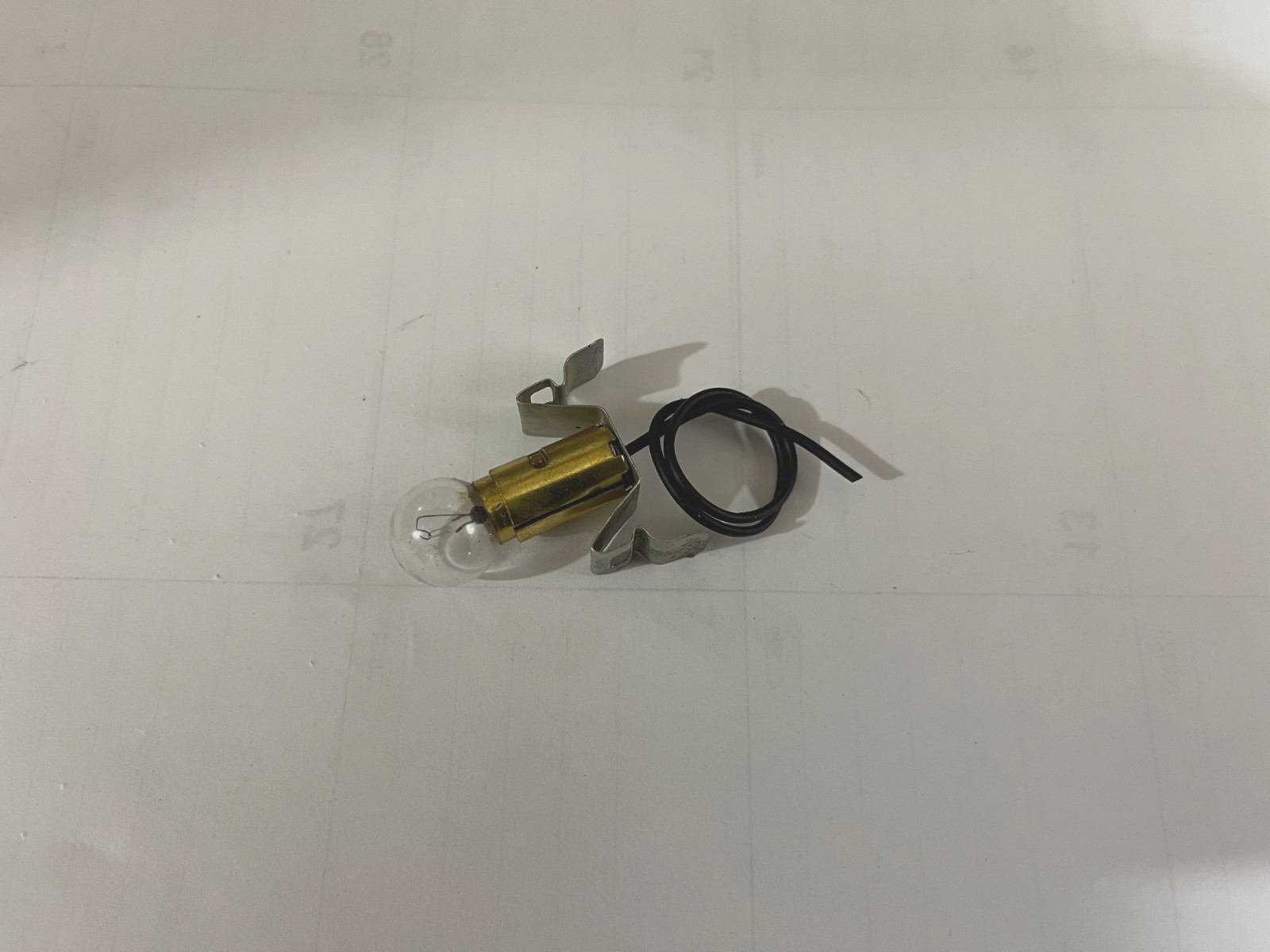 LIONEL PARTS, 6417-11. SOCKET COMPLETE FOR PORTHOLE CABOOSE , 6417 6517 6427