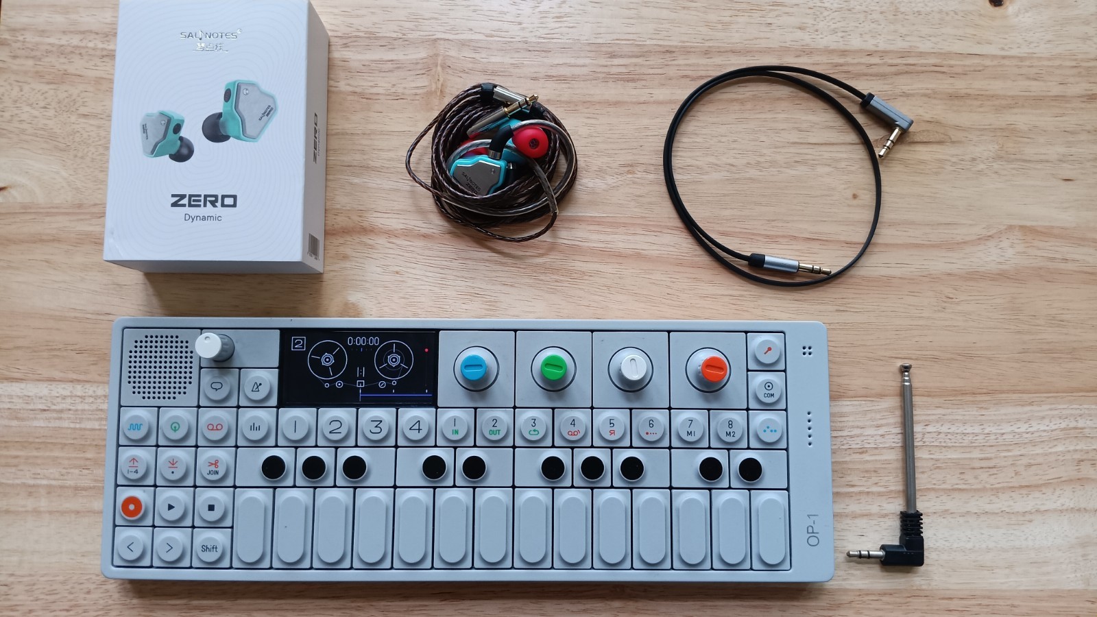 Teenage Engineering OP-1 With IEMs, Aux cord, And FM Radio Antenna