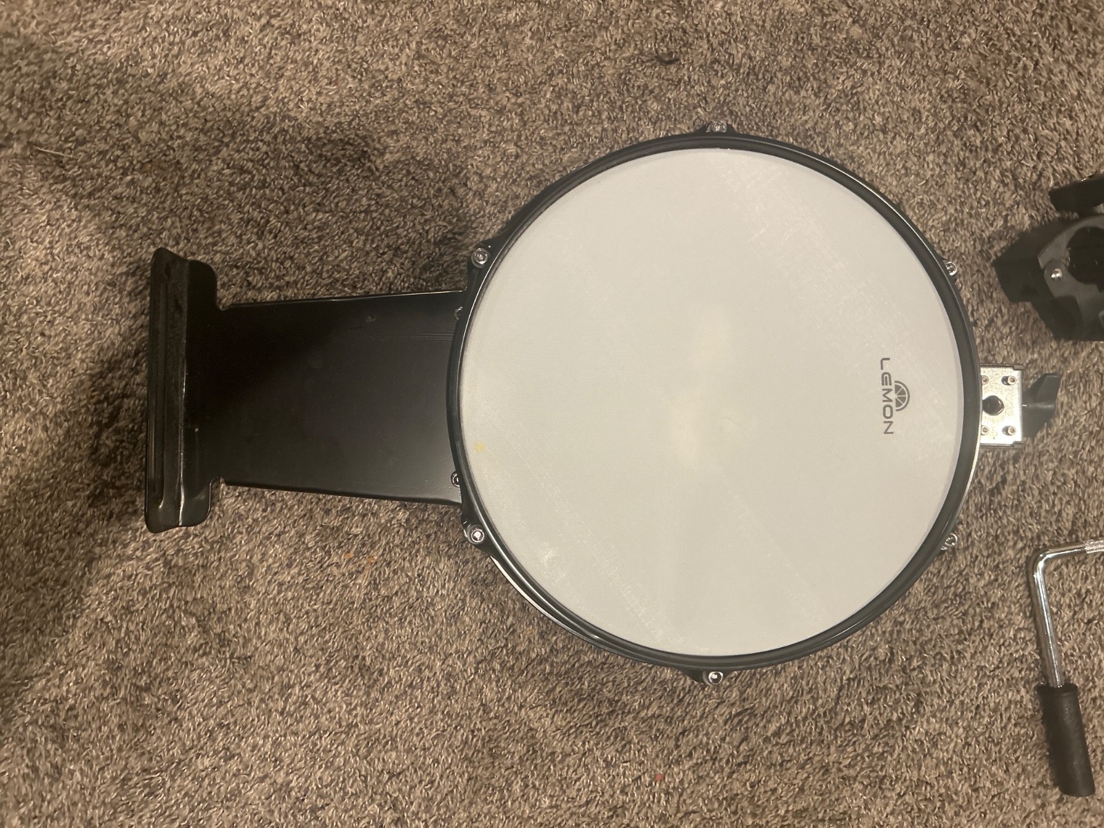 Lemon 12 inch kick pad mounts to your electric drum set good condition
