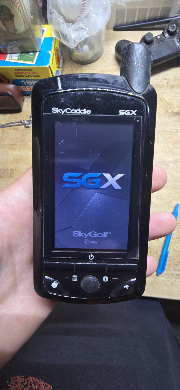 black SkyCaddie SGX handheld golf GPS rangefinder
