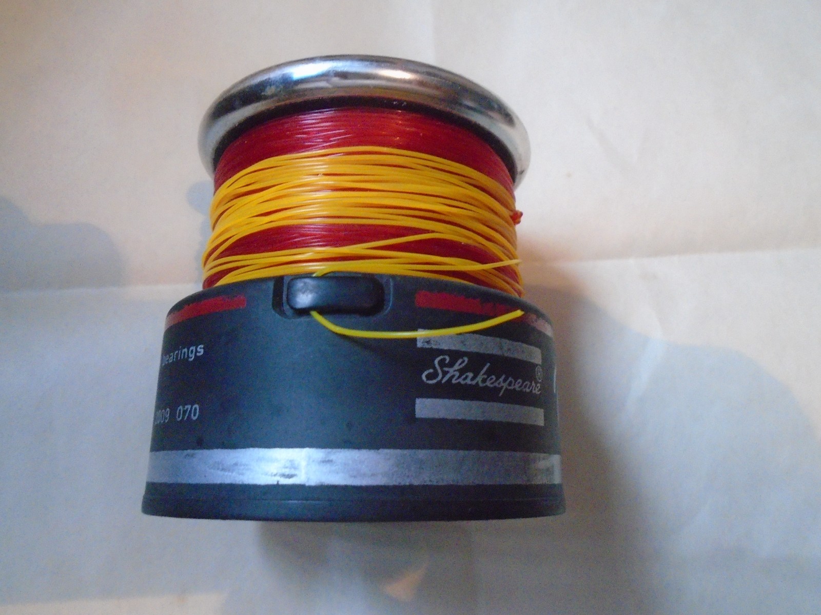 SPARE SPOOL FOR THE SHAKESPEARE ODESSA USED / LINE LOADED