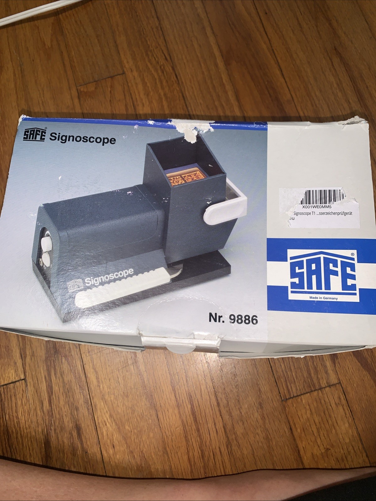SAFE Signoscope device used for detecting watermarks on postage stamps