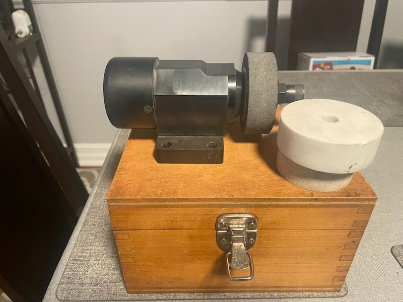 Diamond brake controller to balance and dress diamond wheels