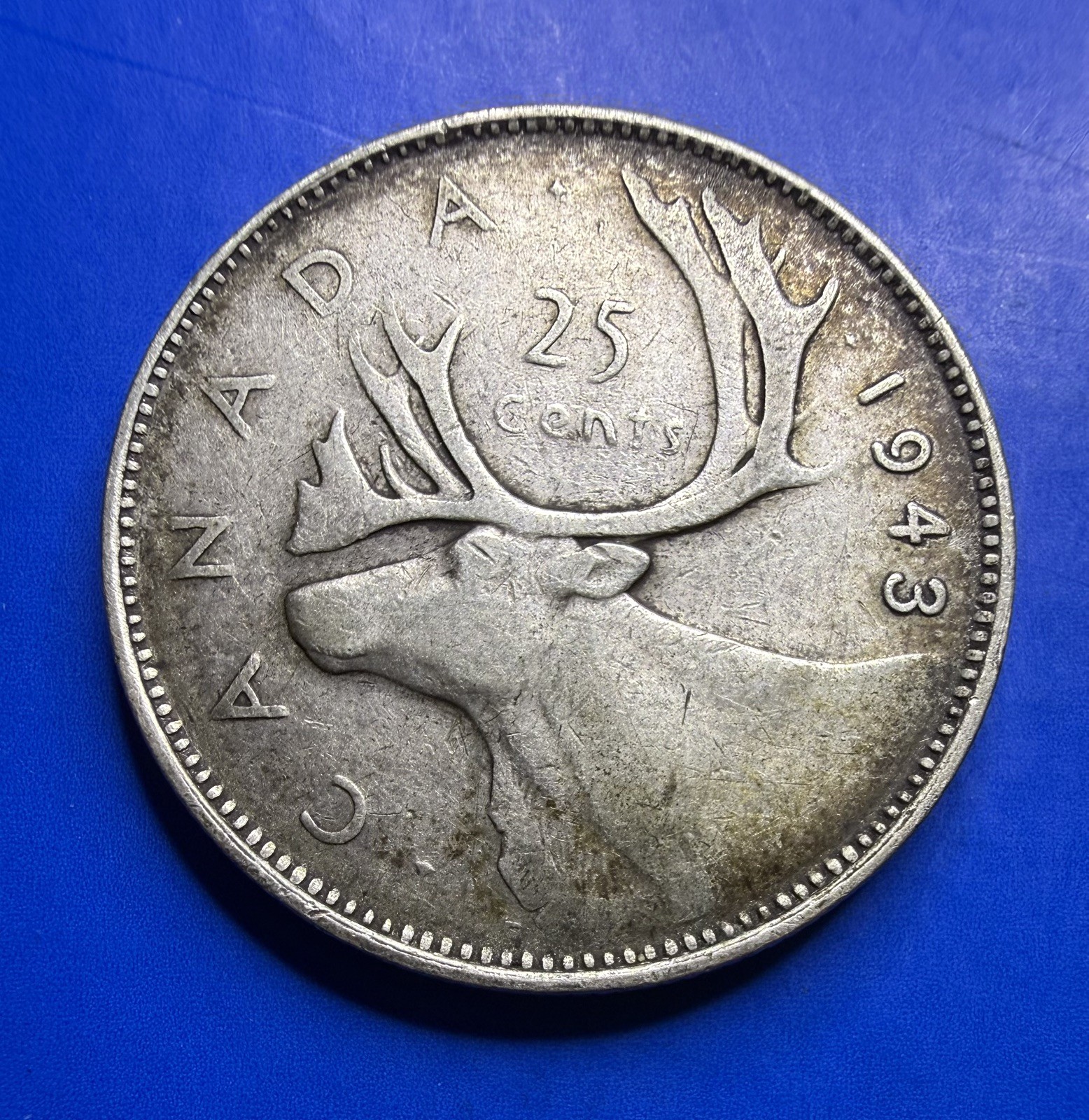 1943 Canada George VI .800 Silver 25 Cent Coin in Circulated Condition.