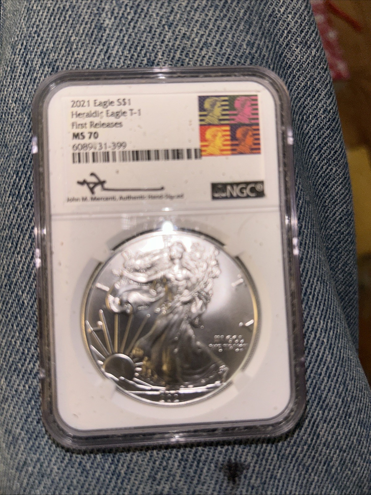 2021 Eagle Heraldic Eagle T-1 First Releases S$1 NGC MS70. Mercanti Signed