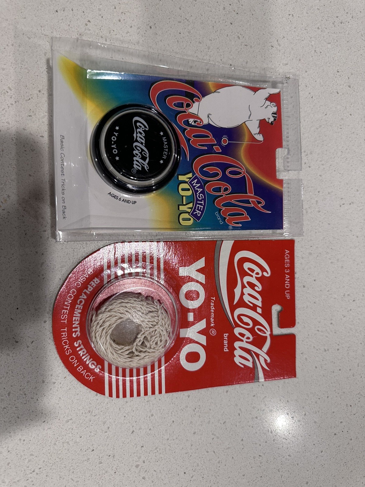 Black Coca Cola 1990 Yo-yo with 6 pack of strings and Wax