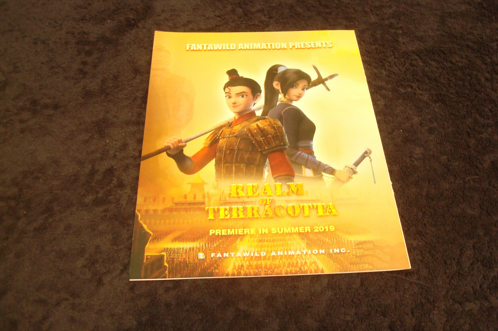 REALM OF TERRACOTTA 2019 ad with Magnus and Jade holding weapons, Fantawild