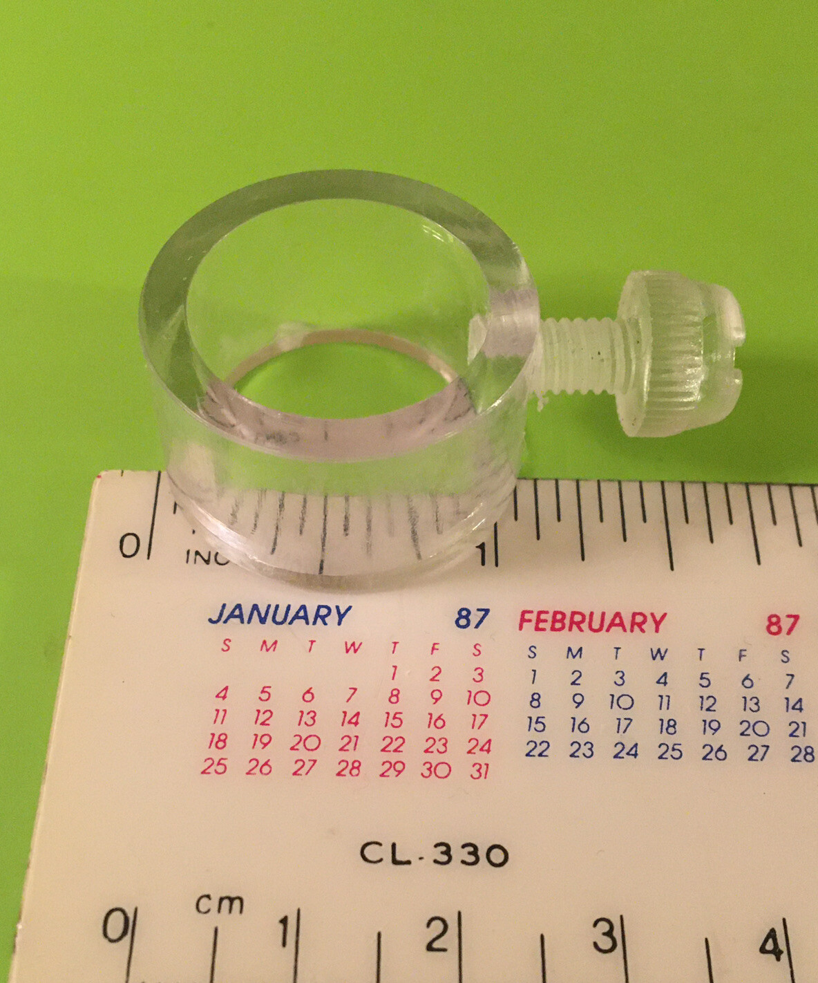 Acrylic round clamp, retail POS signage hardware, about 3/4” diameter, threaded