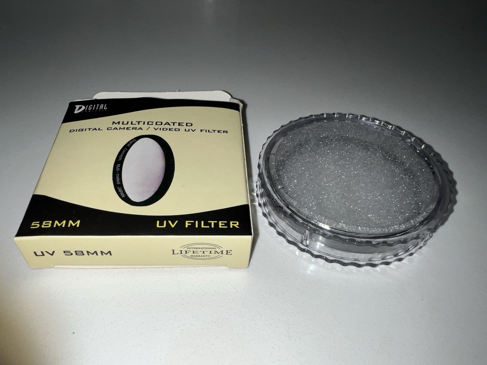 Canon 58mm Filter Kit LP-E5 battery plus Misc Accessories
