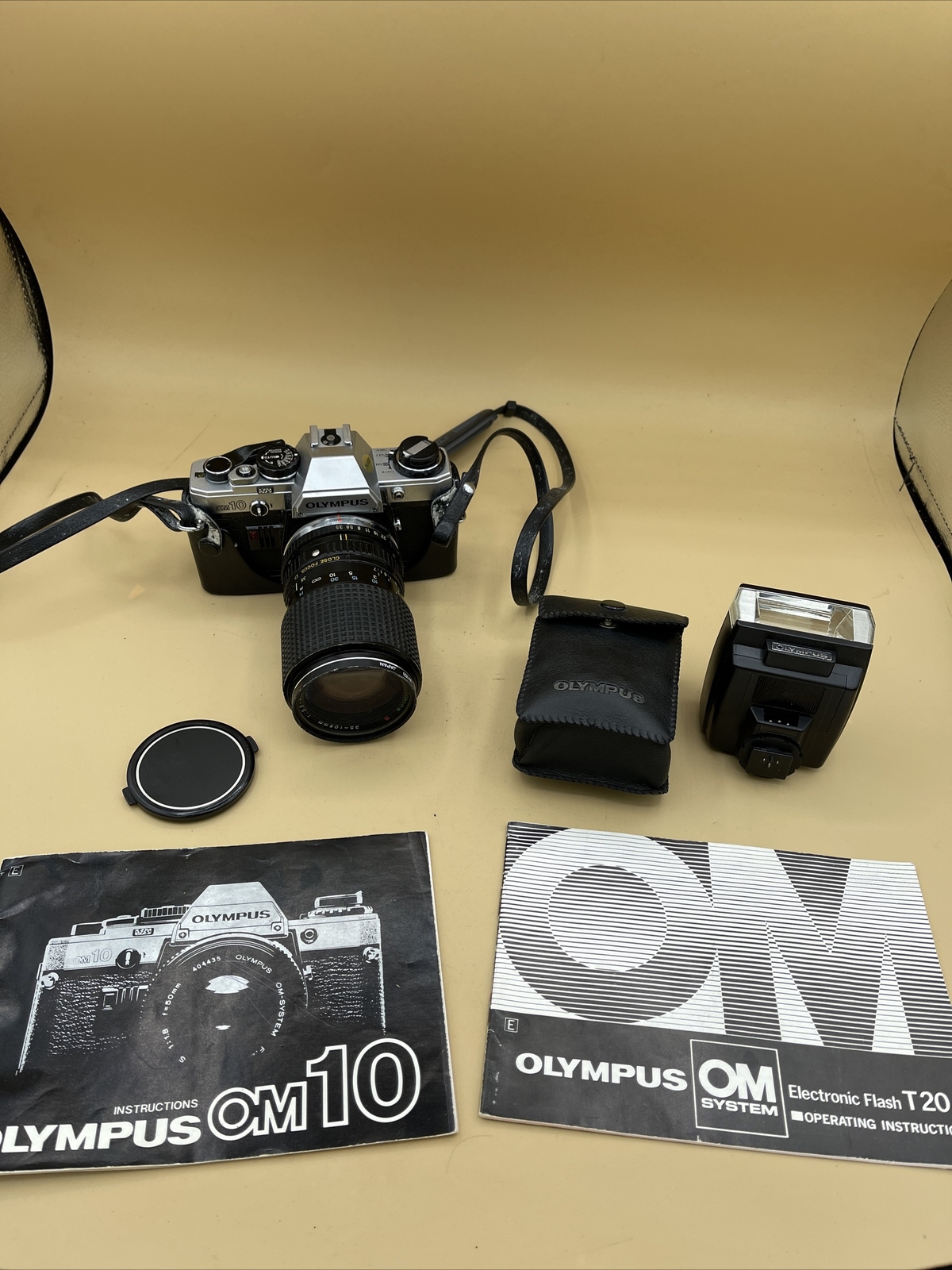 Olympus OM-10 w/ Tokina 35-105mm f/3.5 lens Manuals, T29 Flash* Tested