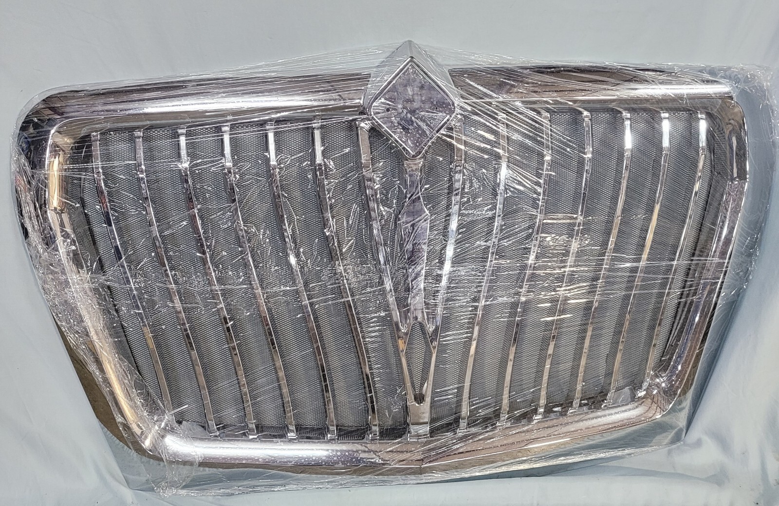 Chrome Grille With Bug Screen Replaces 4039860C92, 4039860C93 For International