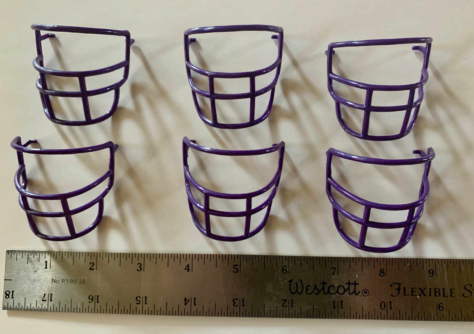 Bobblehead Football Facemasks (Purple) Set of 12