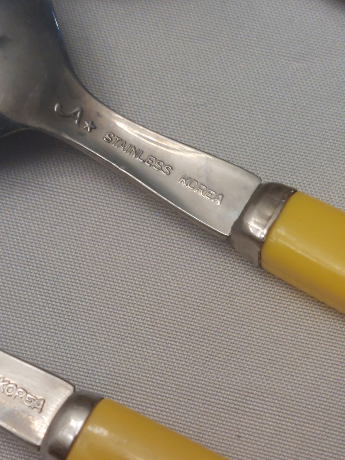 Vintage 16 Piece Anacapa Yellow Melamine Handle Stainless Flatware