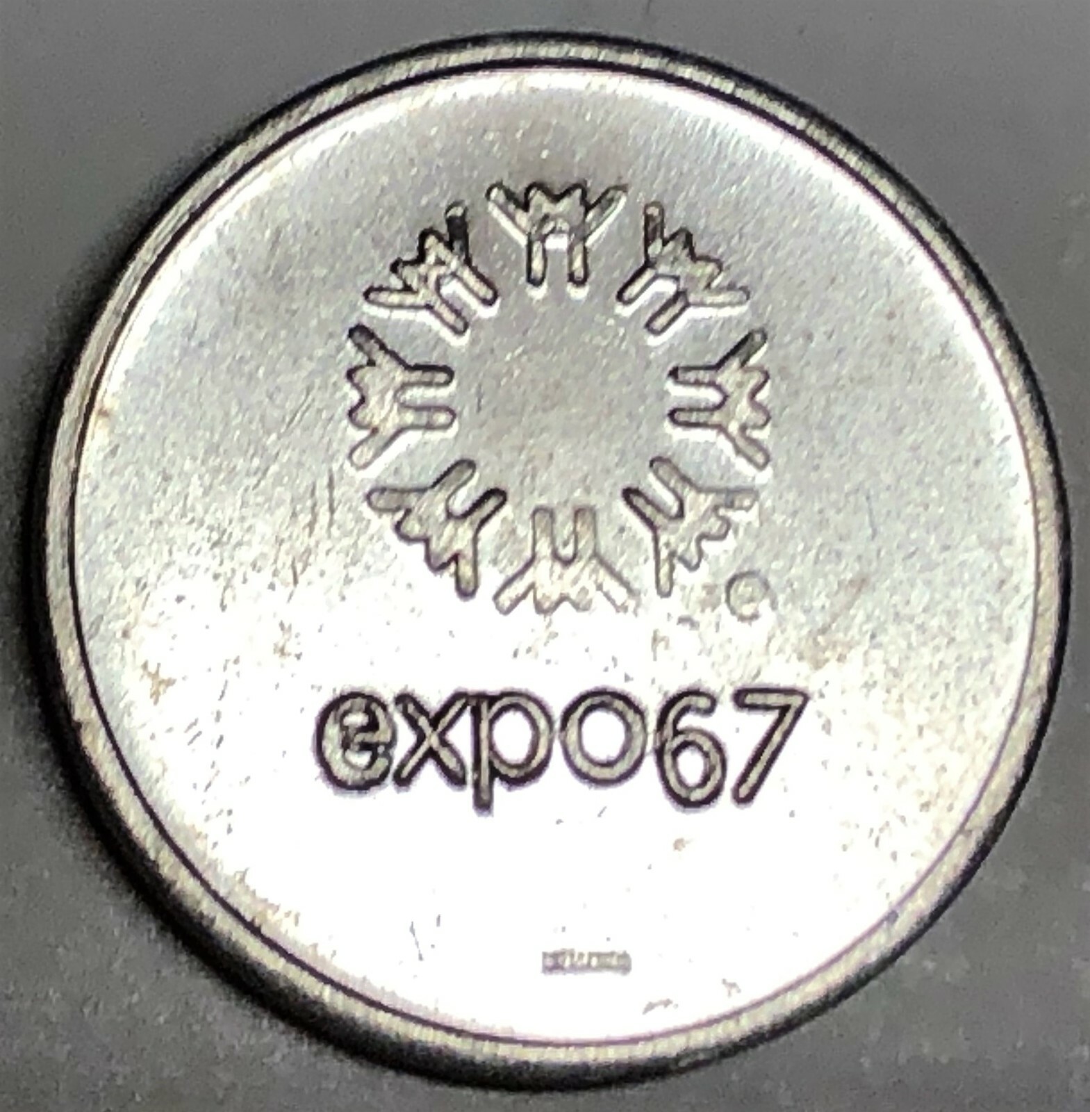 # C3420     EXPO 67     ALUMINUM    TOKEN,