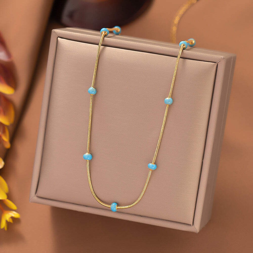 Titanium Steel Ball Drop Glaze Necklace For Women With A Colorless And Advanced