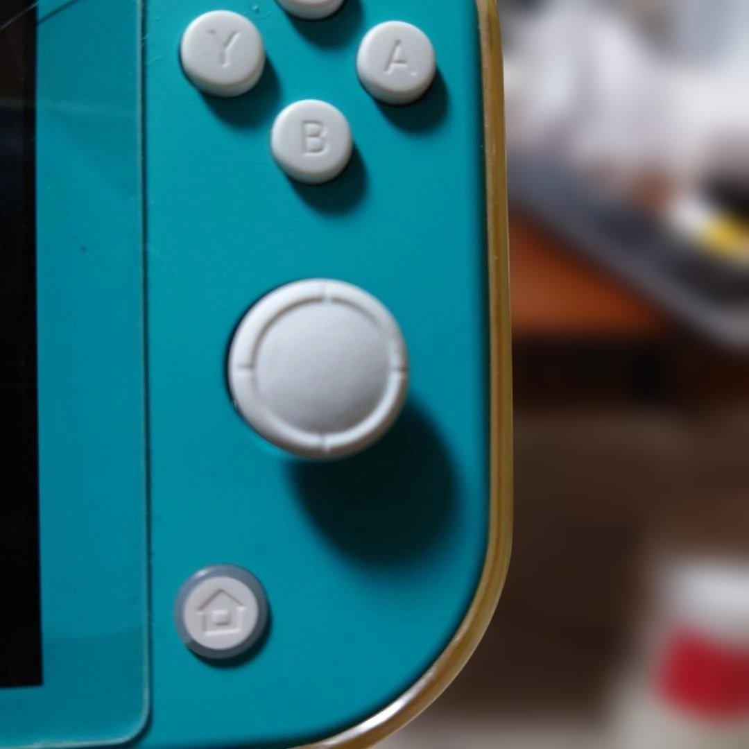 Excellent condition Nintendo Switch Lite Turquoise with Charger and Box