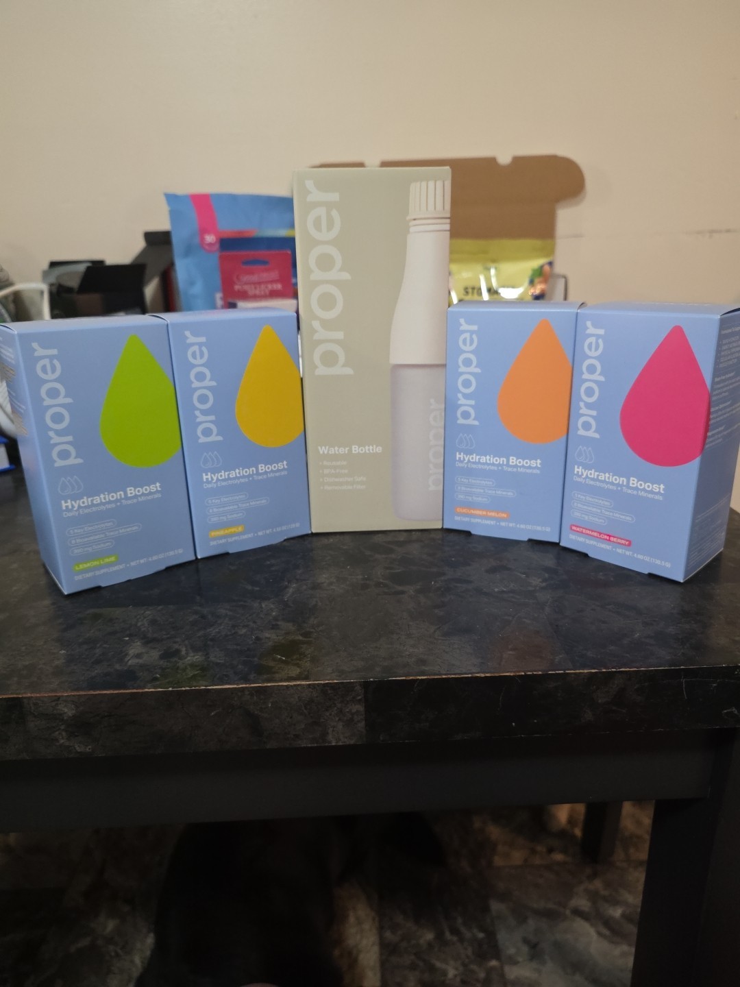 Proper Water Bottle And  60 Hydration Boost Stick Packs Lemon Lime Pineapple Etc