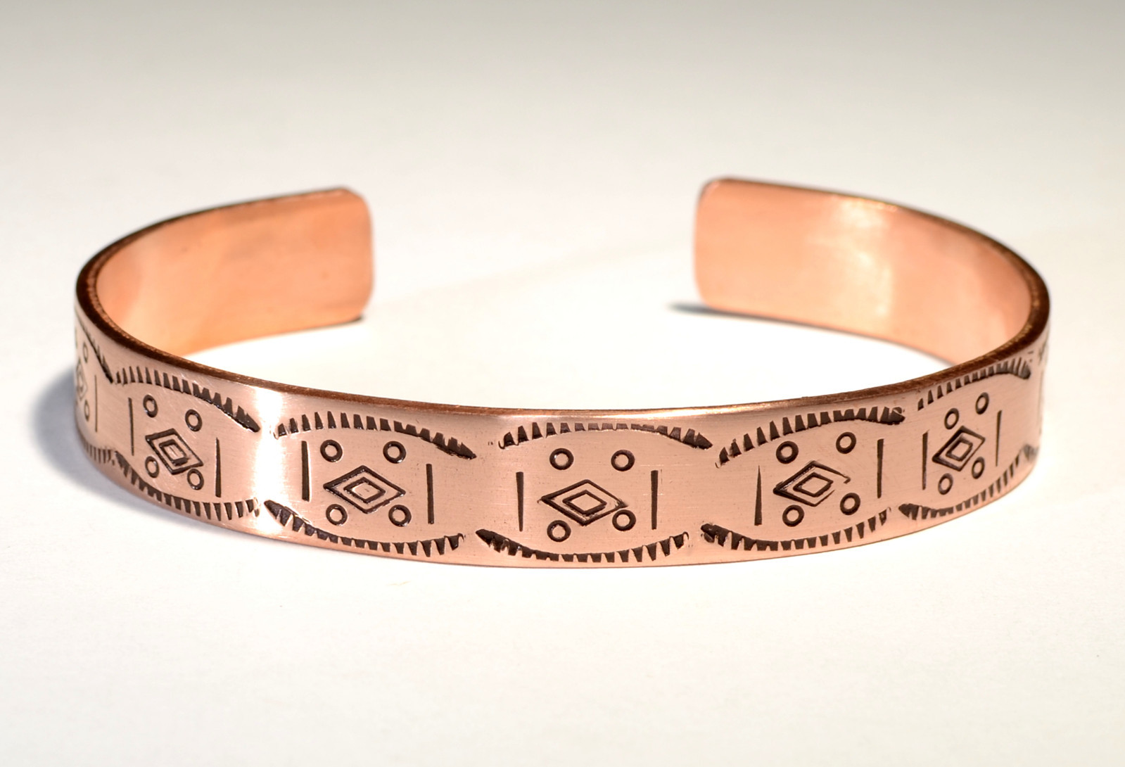 copper cuff bracelet with hand stamped design