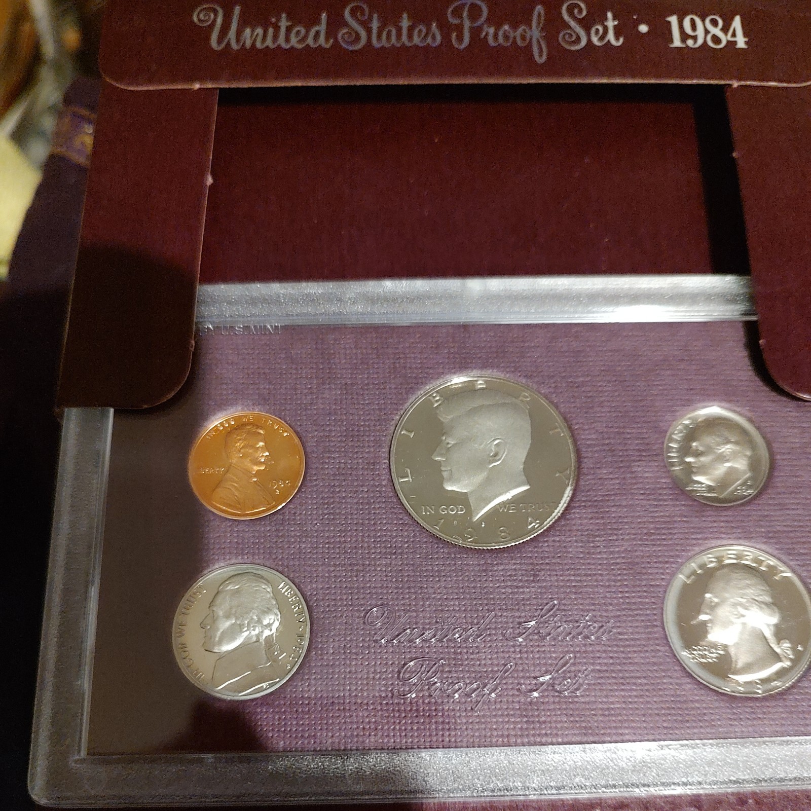 1984 United States Proof Set Uncerculated coins 1¢ 5¢ 10¢ 25¢ & 50¢ as pictured.
