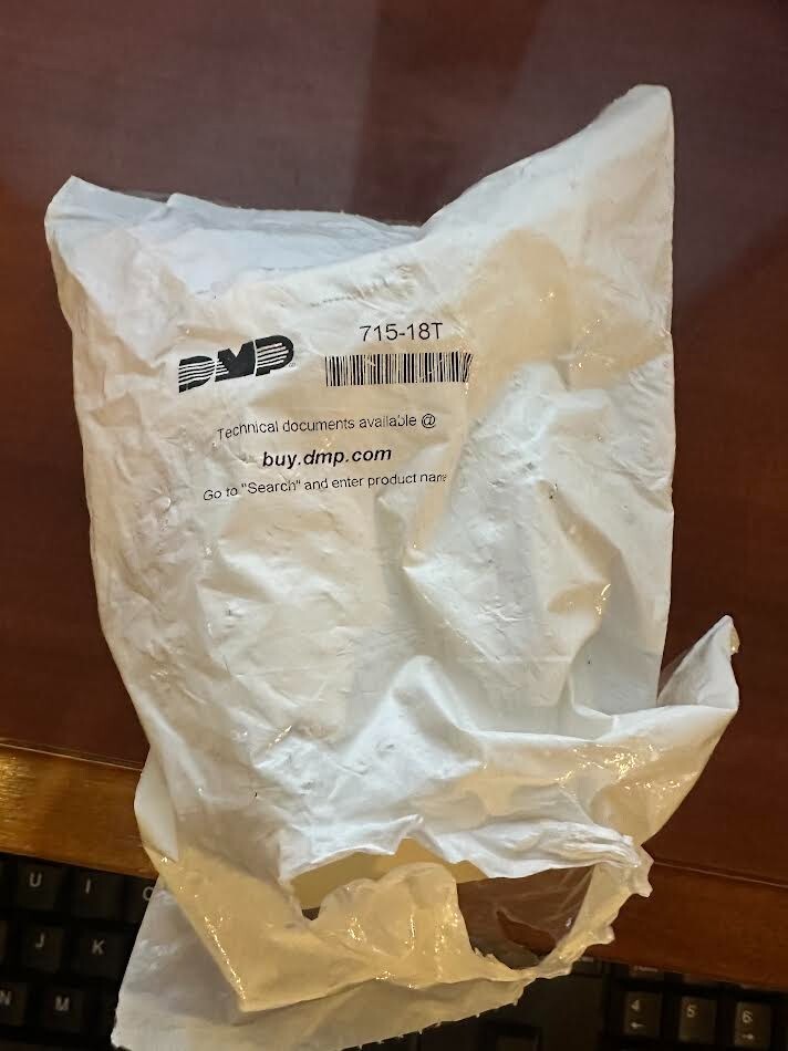 DMP 715-18T ZONE EXPANDER WITH PLUG IN SCREW TERMINAL. NEW IN FACTORY PACKAGING