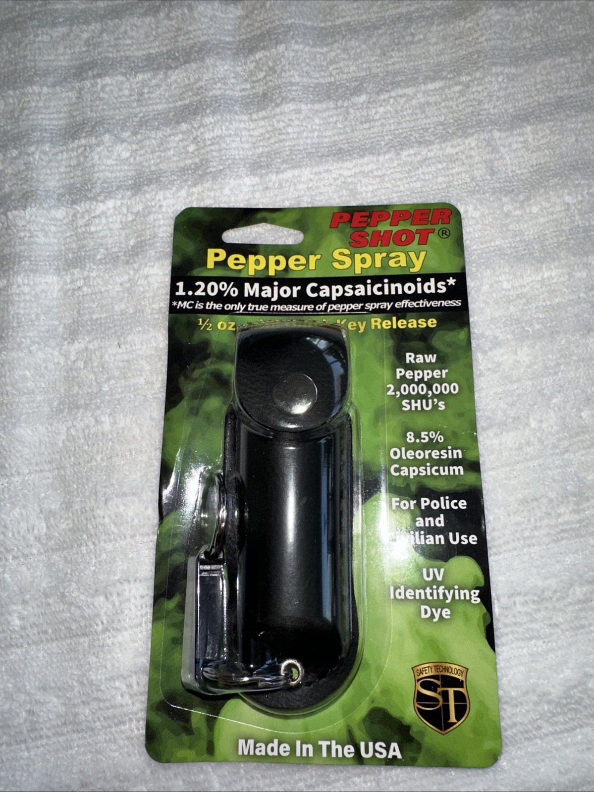 Pepper Shot 1.2% MC 1/2 oz Pepper Spray black holster and quick release keychain