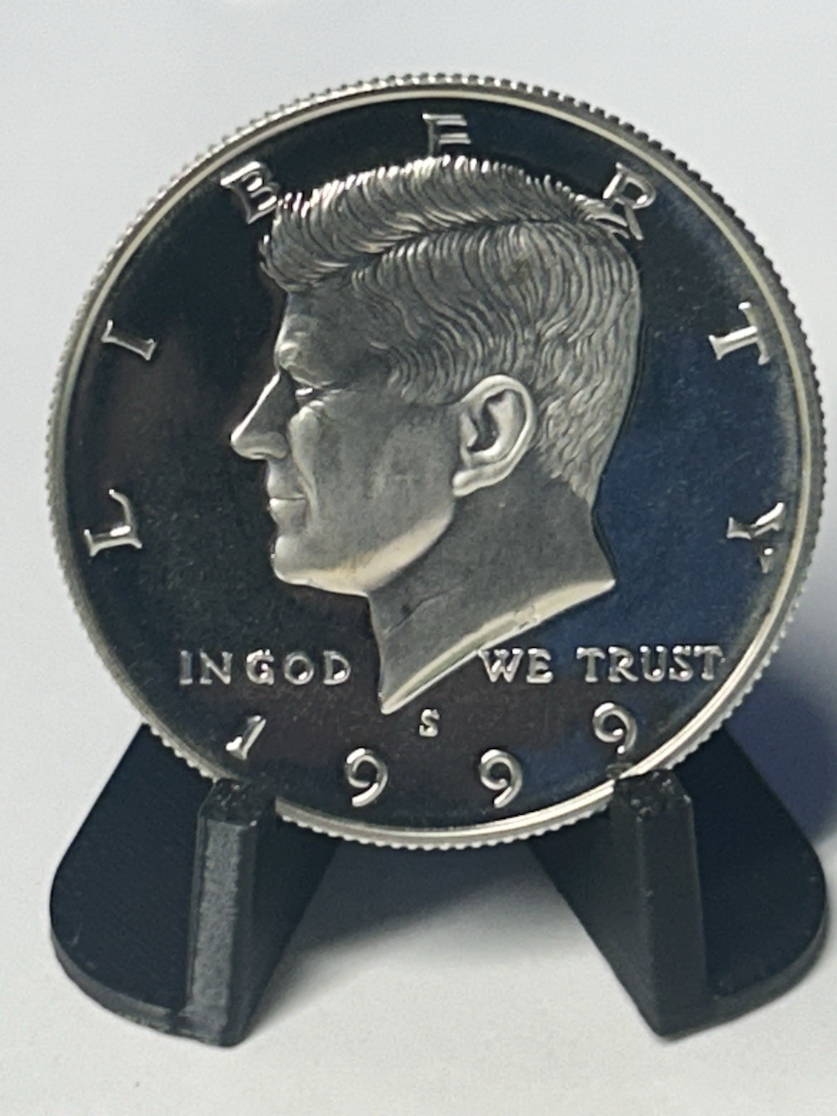 1999-S SILVER PROOF KENNEDY HALF in a plastic holder with stand for displaying