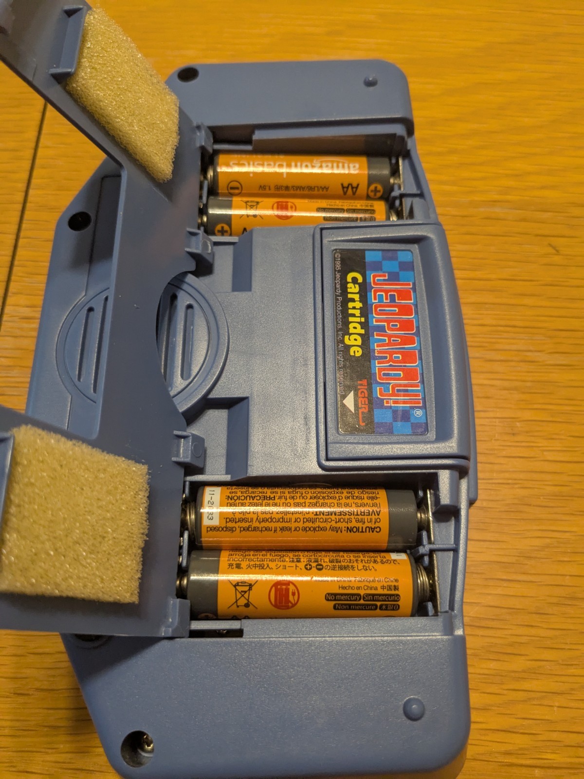 Tiger Electronics Jeopardy Hand Held Game 1995 with Answer Question Book