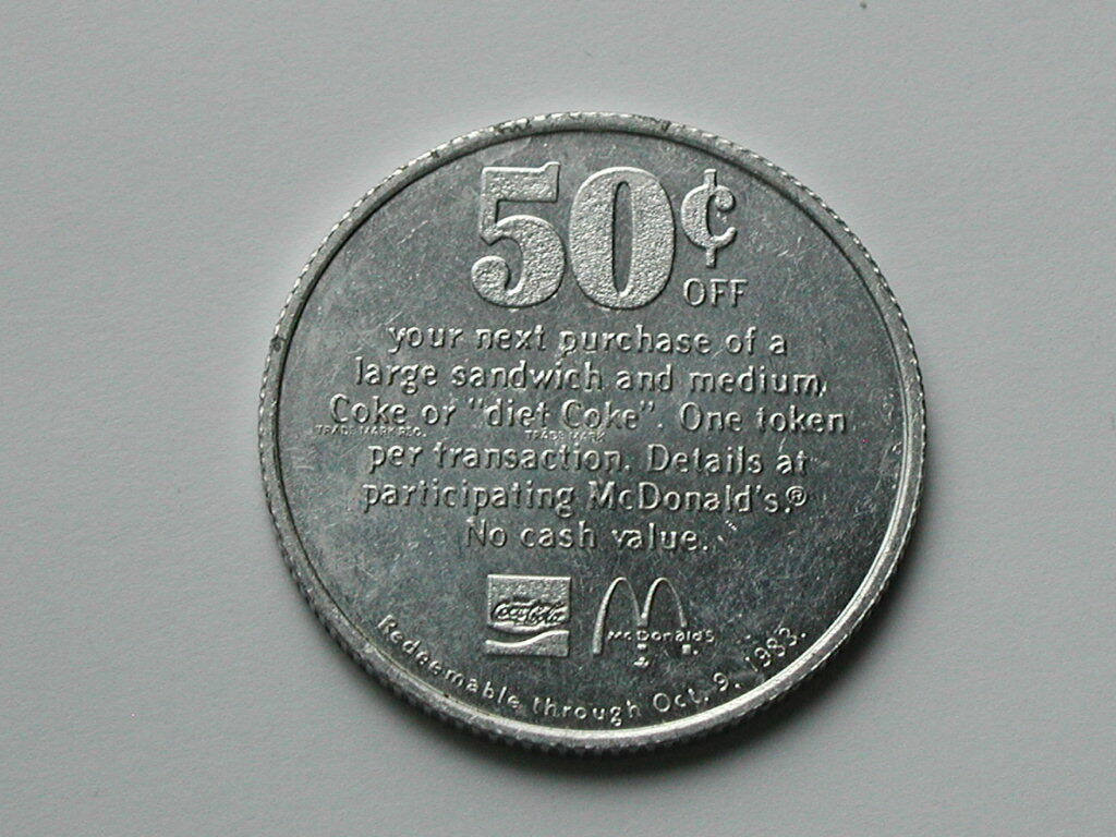McDonald's Canada 1983 Aluminum Token Good For 50 Cents Off Sandwich with a Coke