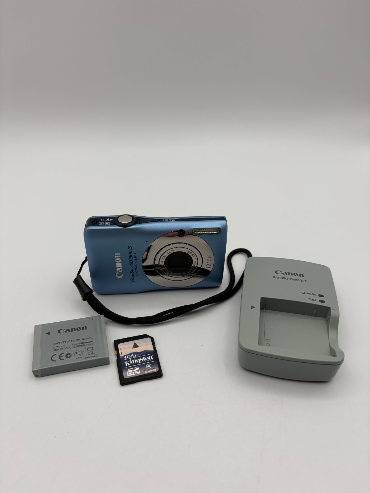 Canon PowerShot SD1300 IS 12.1MP Digital ELPH Camera Blue w/4x Zoom Bundle
