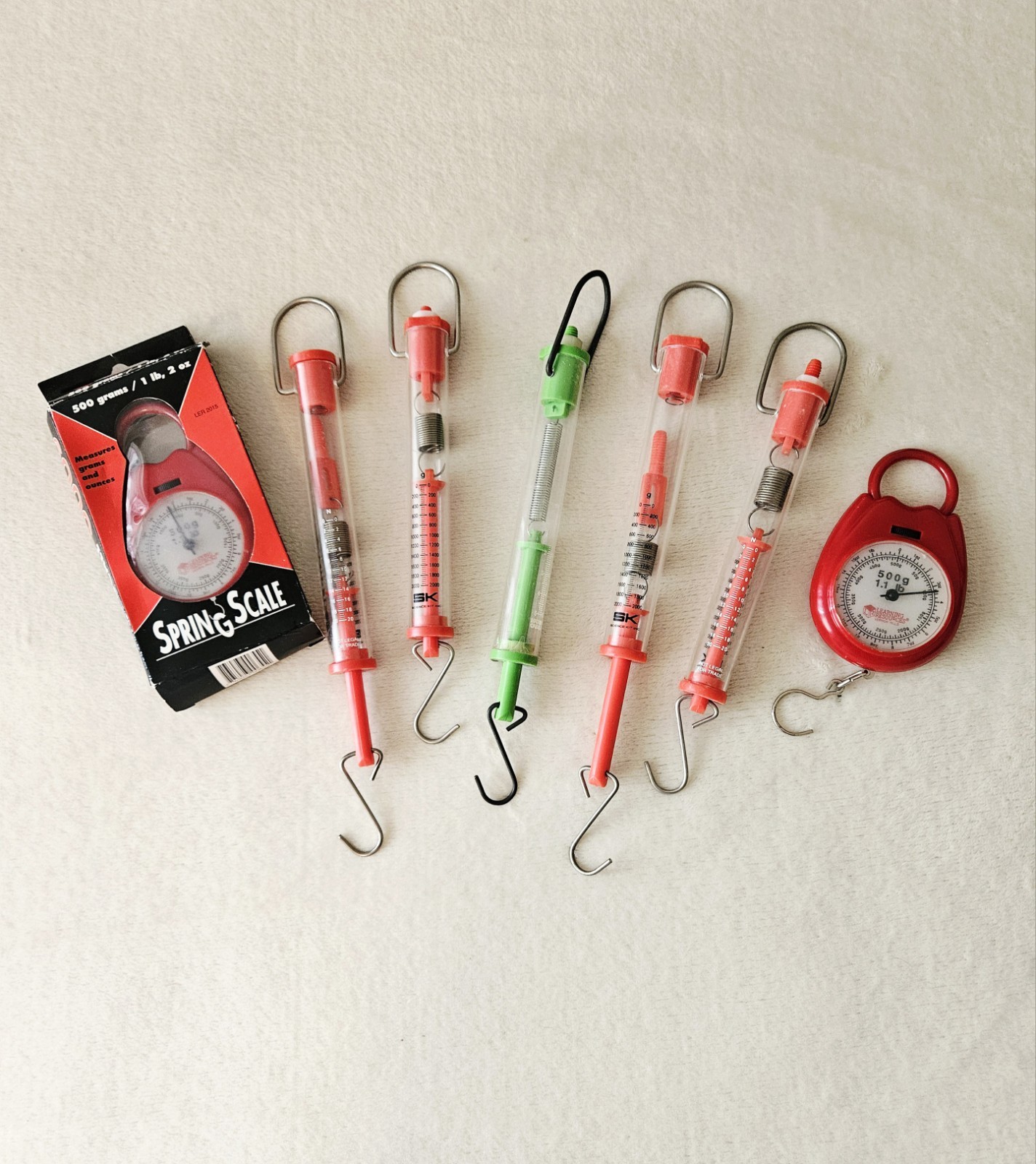 Lot of 7 Hanging Spring Scales:  5 Tube Scales & 2 Round Scales