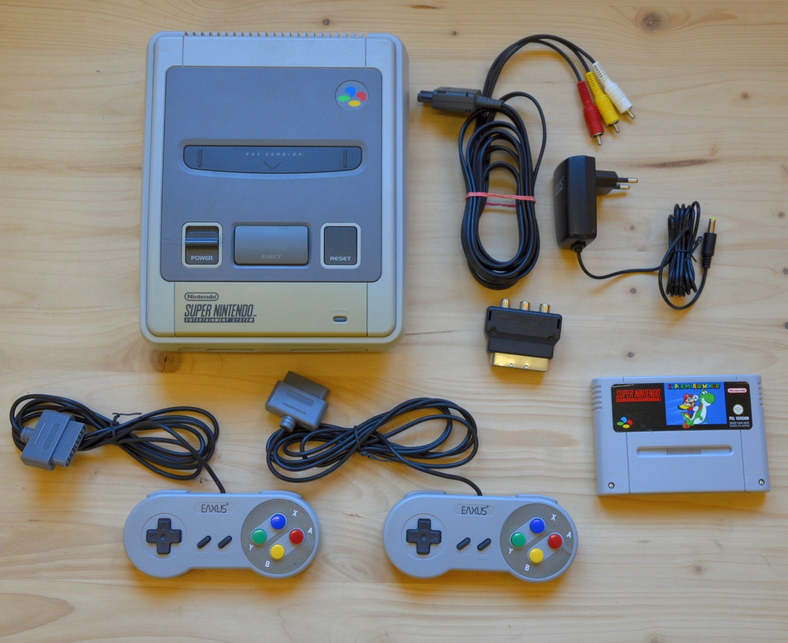 SNES - Super Nintendo Console with 2 Controllers + Super Mario World