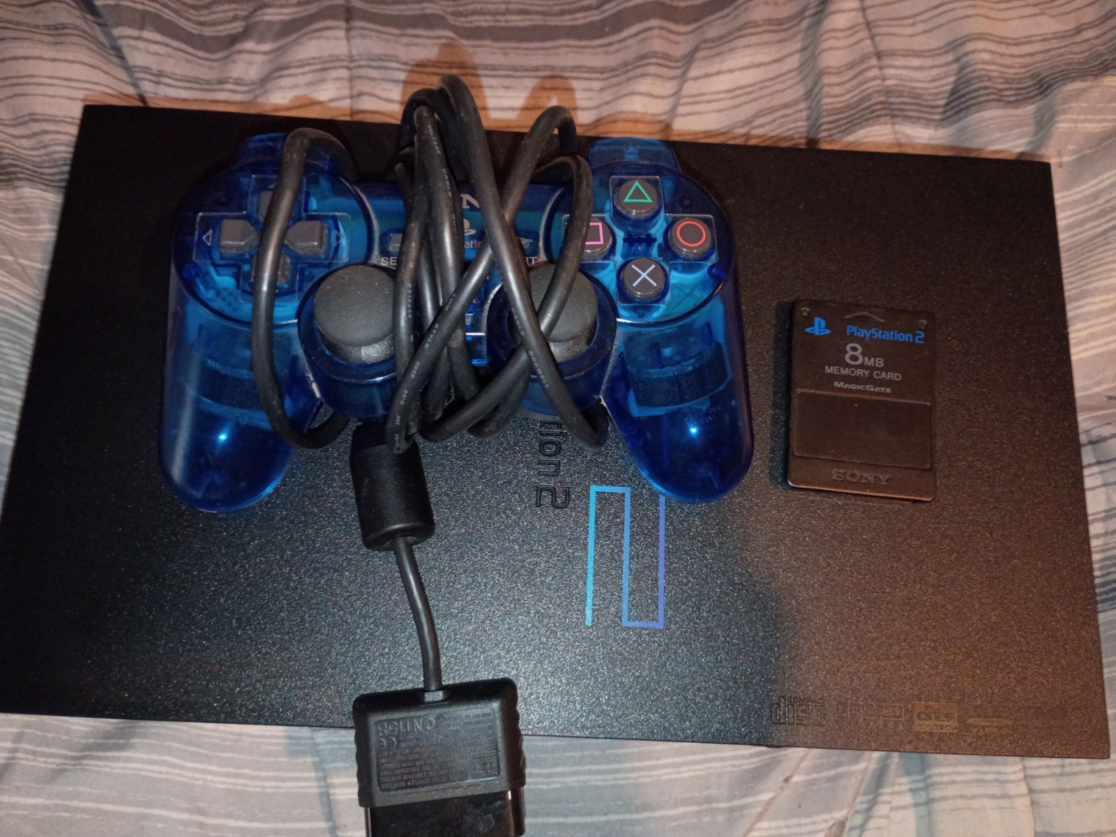 Sony PlayStation 2 Black Phat Model. Comes with Everything Needed to Play.