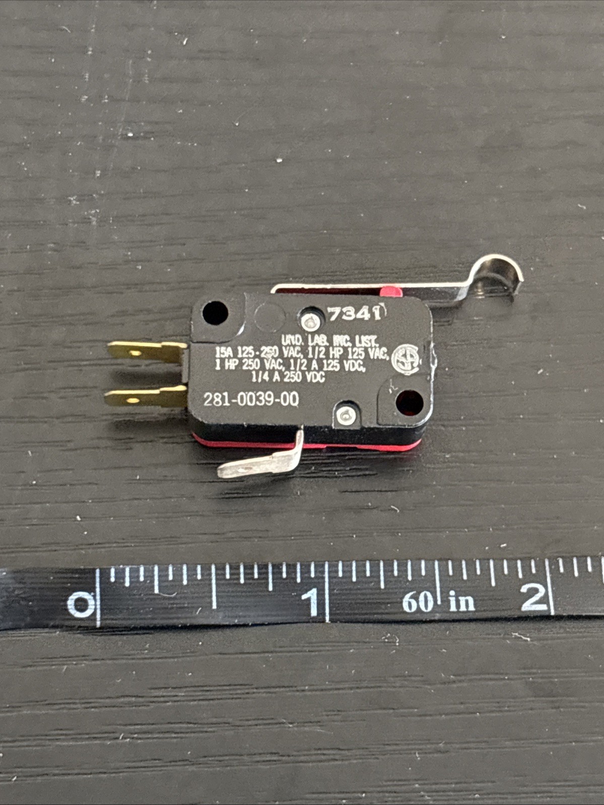 snap-action micro switch with a lever actuator. PN VLD0039