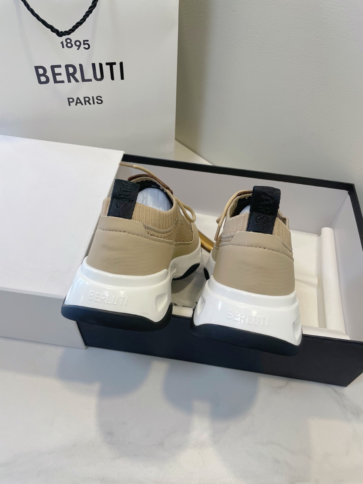 Berluti's new Shadow casual athletic shoes for men, size 44.