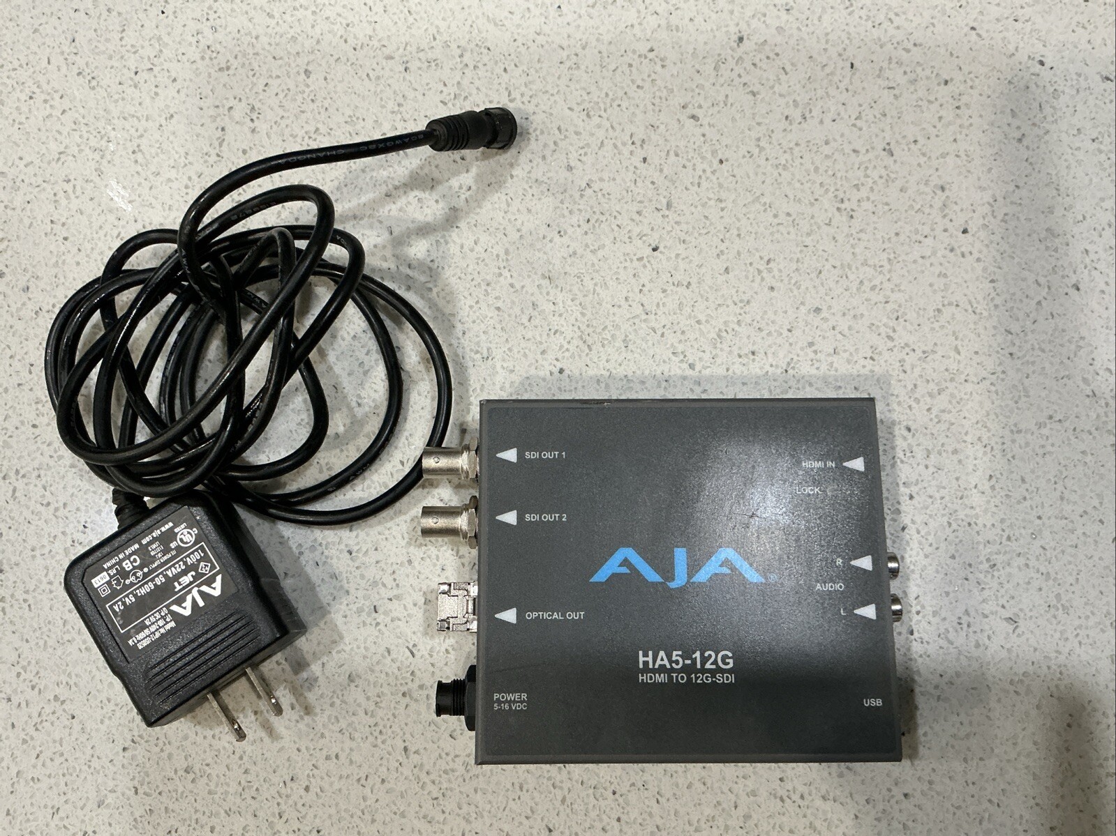 AJA HA5-12G-T HDMI 2.0 to 12G-SDI Mini-Converter, Fiber Tx port, & power supply