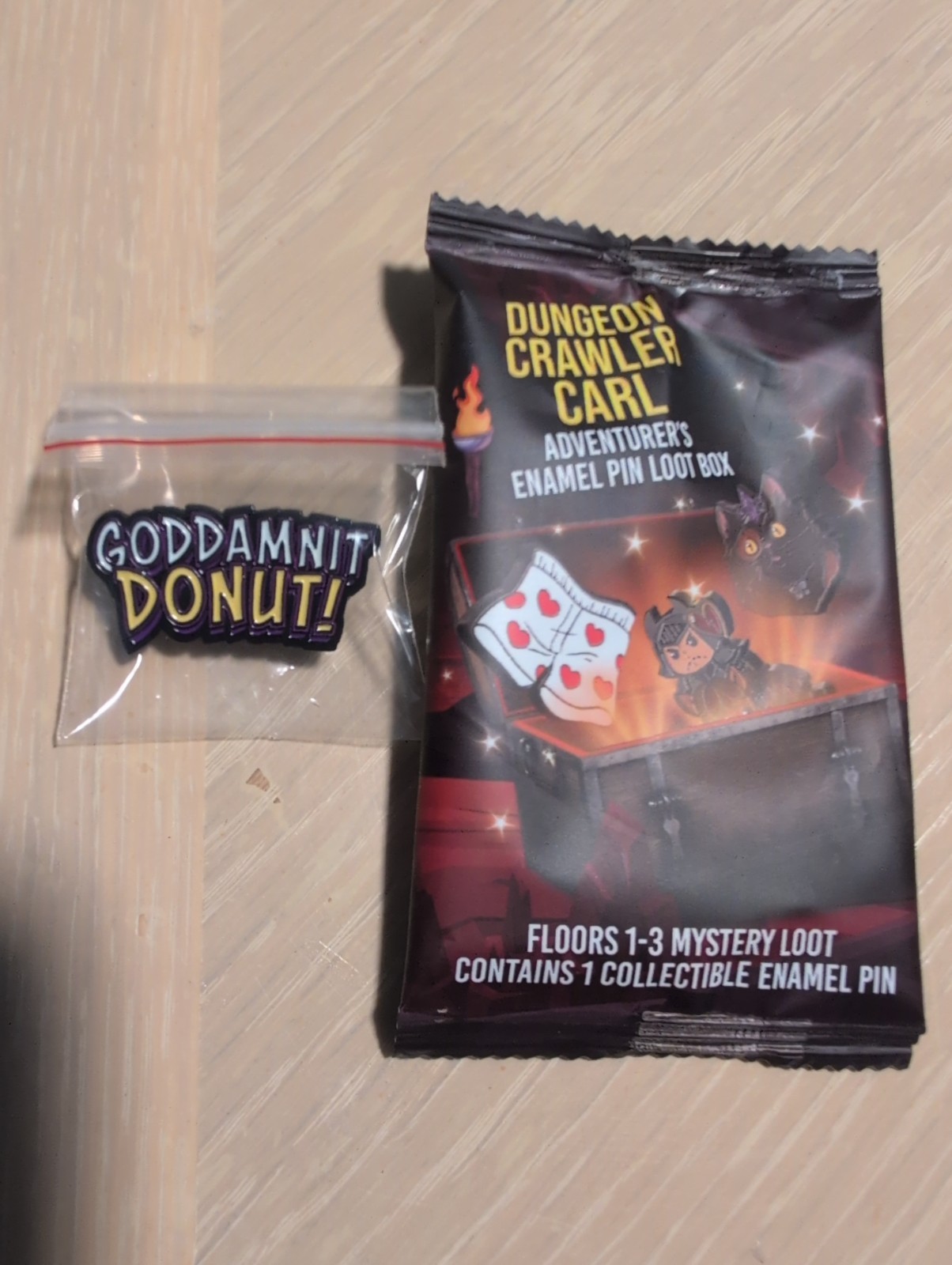 Dungeon Crawler Carl “Goddamnit Donut" Enamel Pin – Foam Brain Games – New!