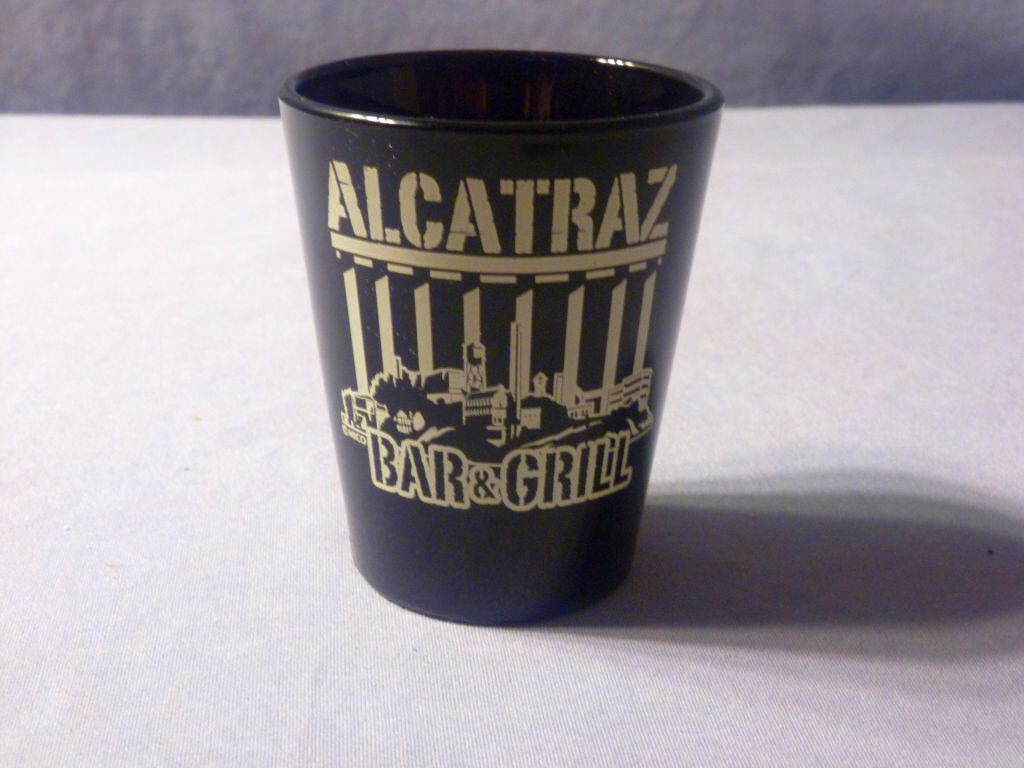 Alcatraz Bar & Grill Shot Glass Black with White Print - good condition