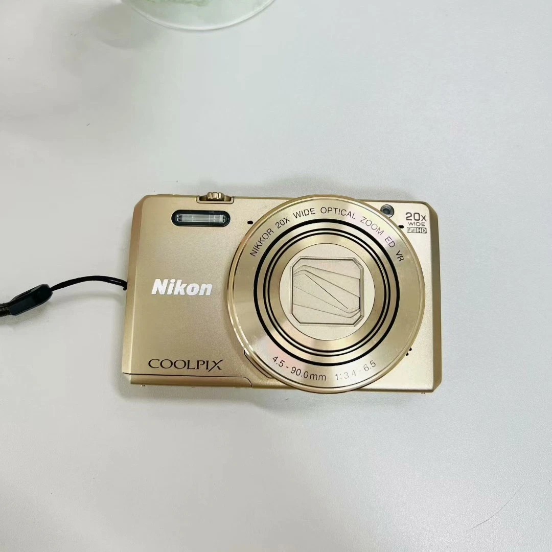 Nikon COOLPIX S7000 Digital Camera 16 MP 20x Optical Zoom with Accessories Gold