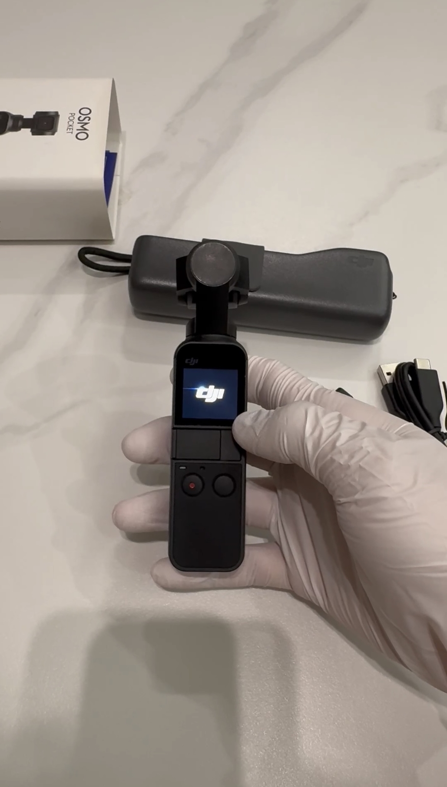 DJI Osmo Pocket-Handheld 3-Axis Gimbal Stabilizer with integrated Camera