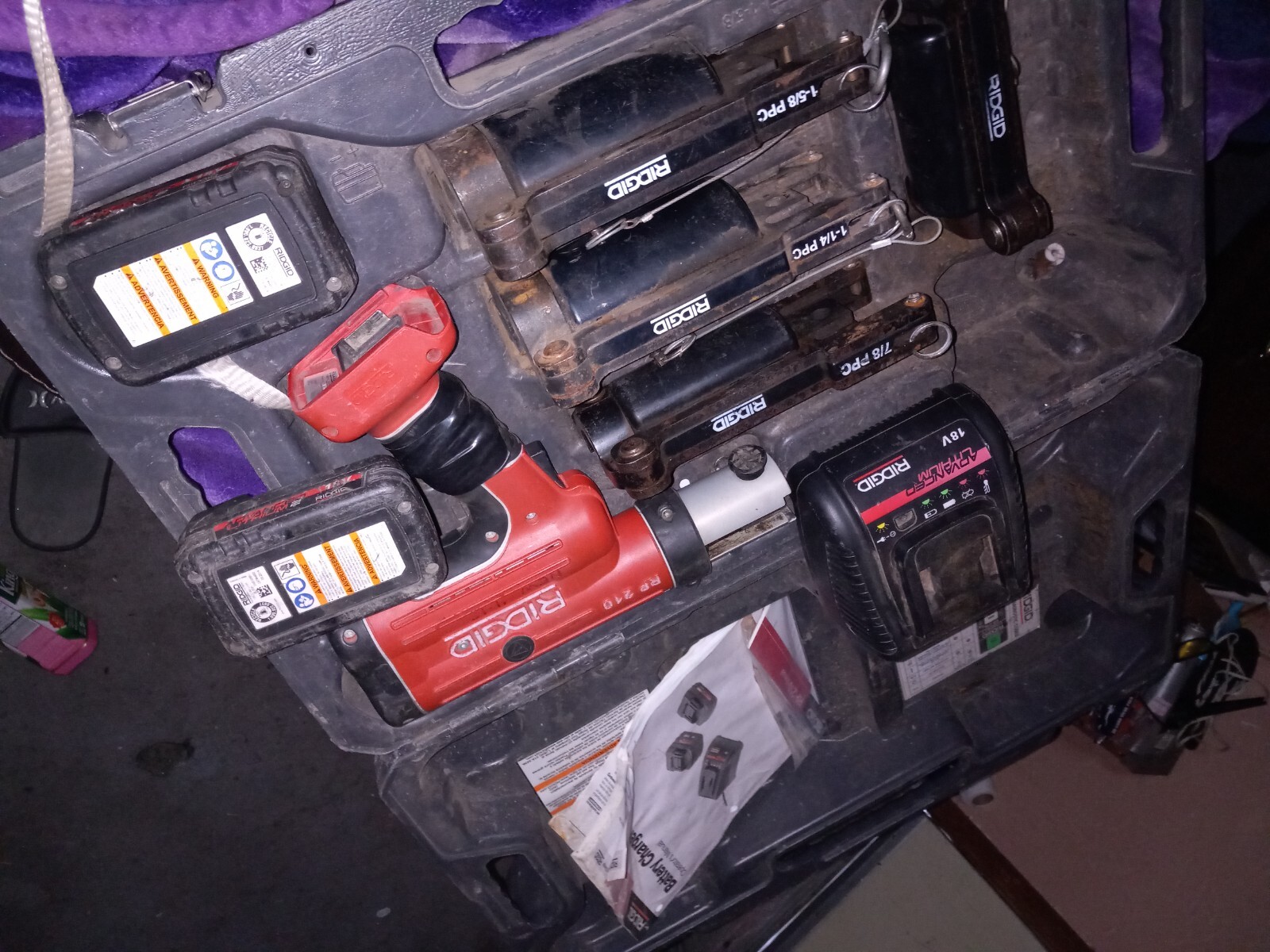 Ridgid RP 210 + charger = Battery + 4 jaws