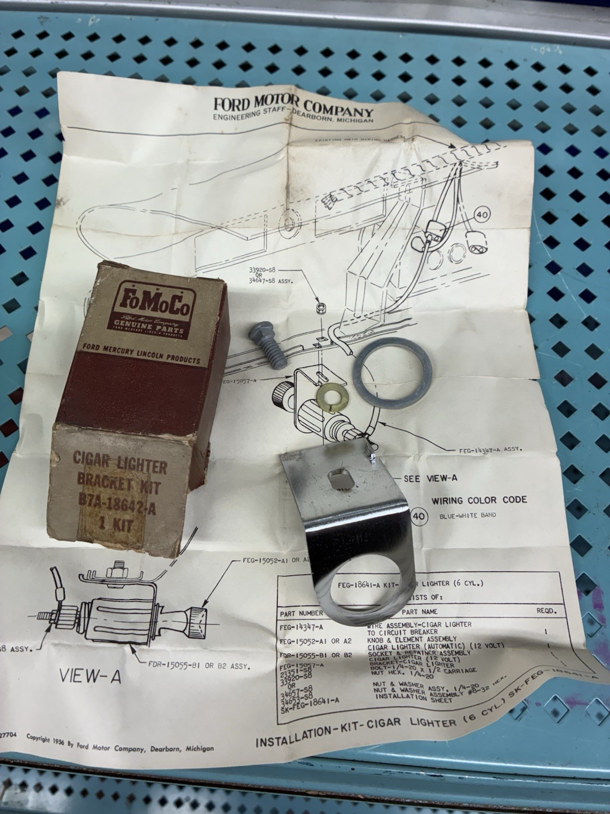 1957-58 FORD  UNDER DASH CIGAR LIGHTER BRACKET  NOS FORD