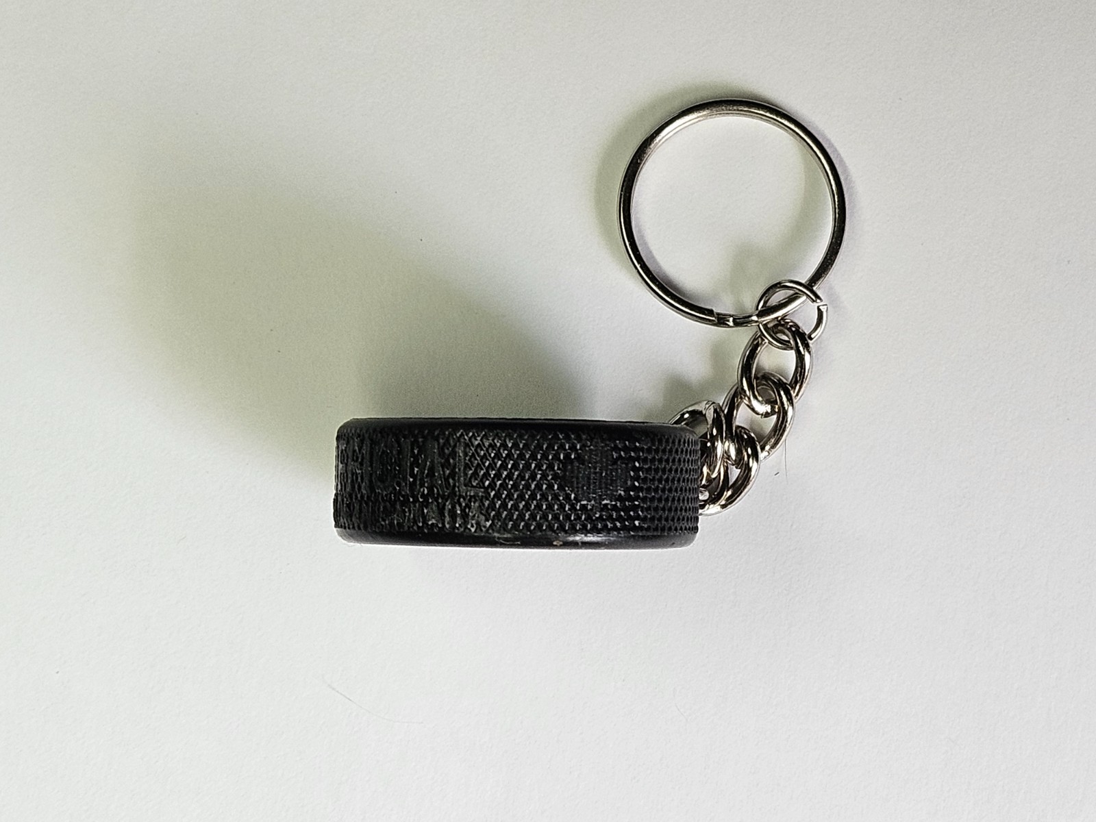 Carolina Hurricanes Mini Puck Key Chain by Inglasco