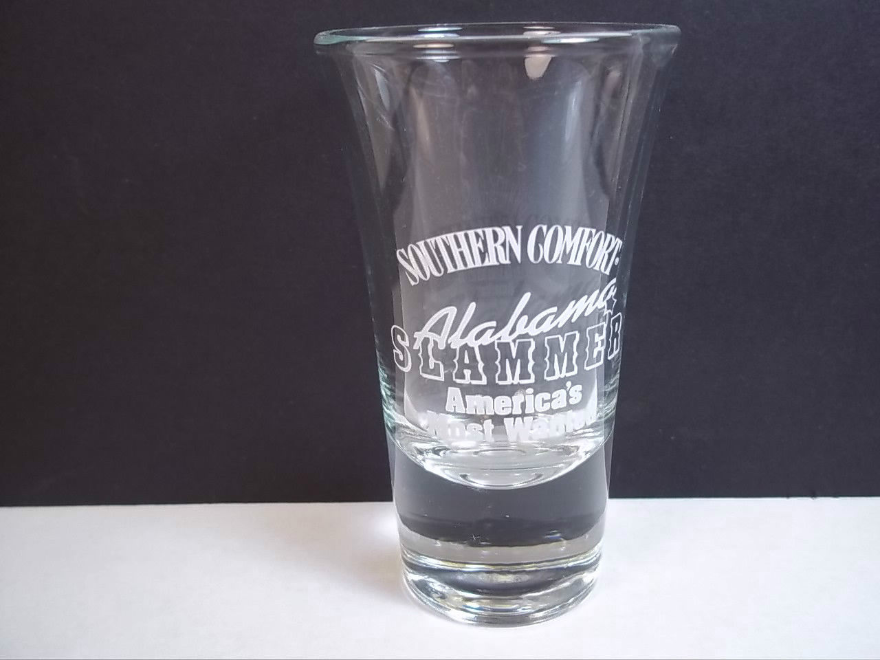 Southern Comfort Alabama Slammer tapered shot glass America's Most Wanted