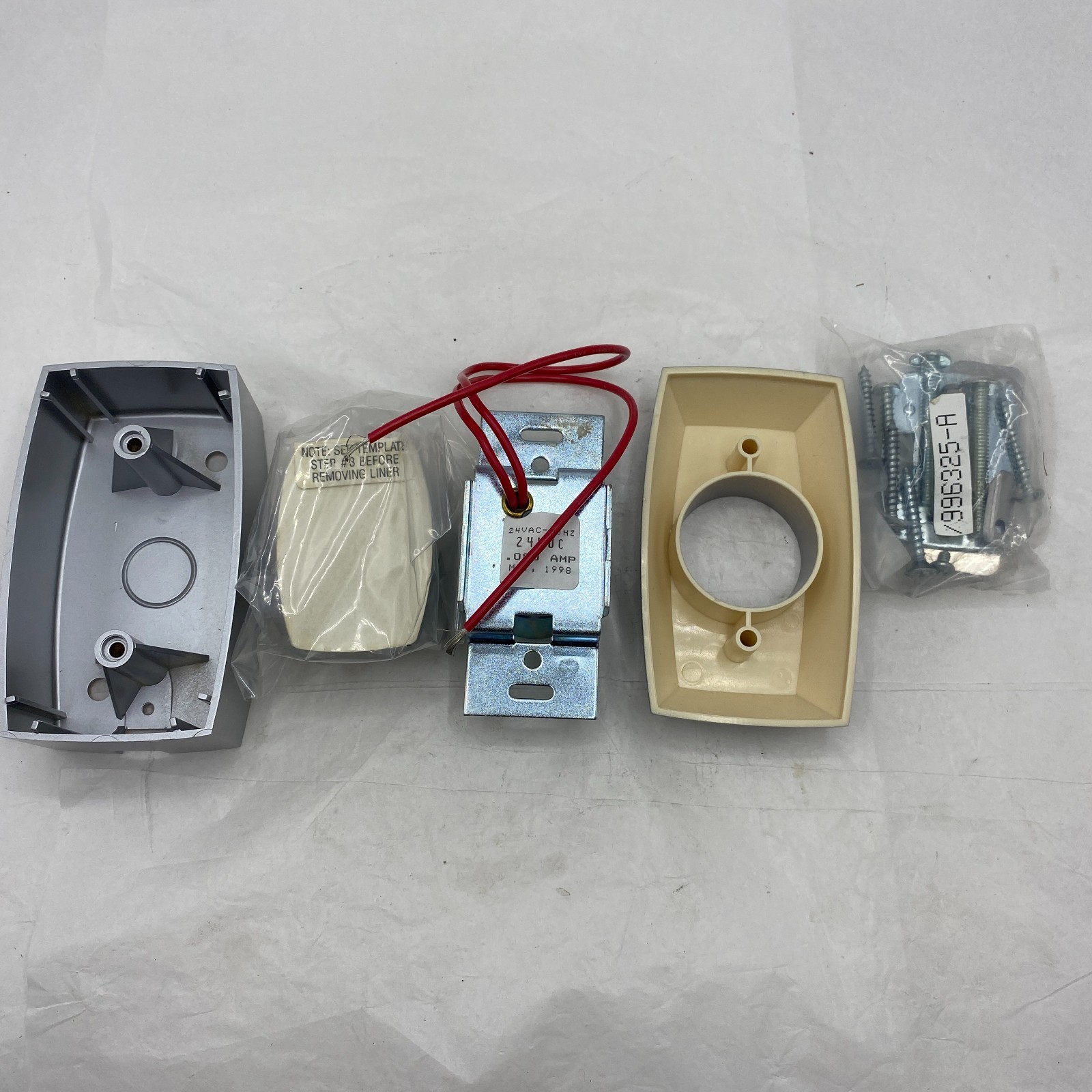 NOTIFIER FIRE-LITE FM996 SURFACE/FLUSH TRI-VOLTAGE ELECTROMAGNETIC DOOR HOLDER