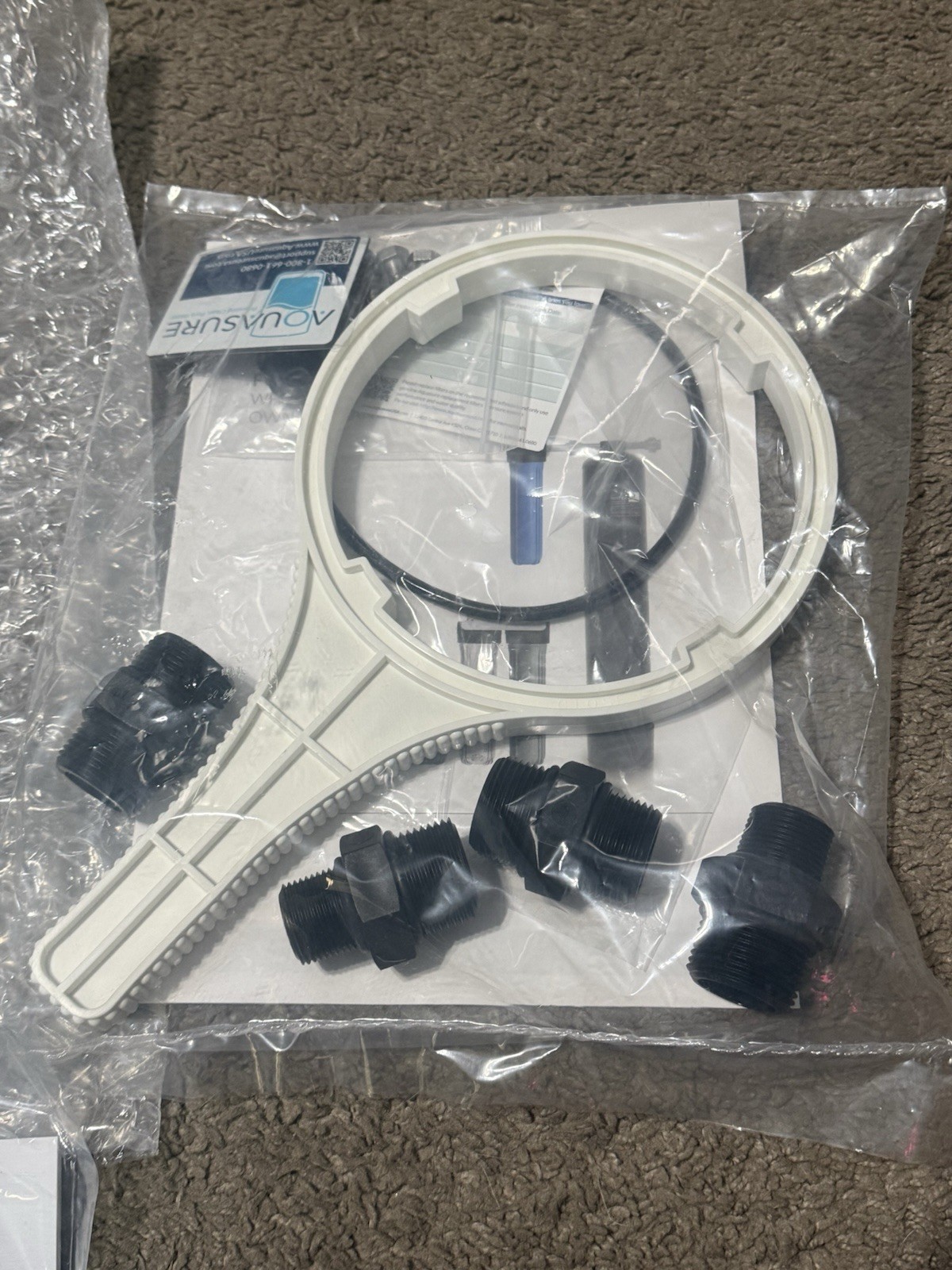 AQUASURE REPLACMENT FILTER CANSITER AND MOUNTING BRACKET AND HOSE TOOLS ETC.