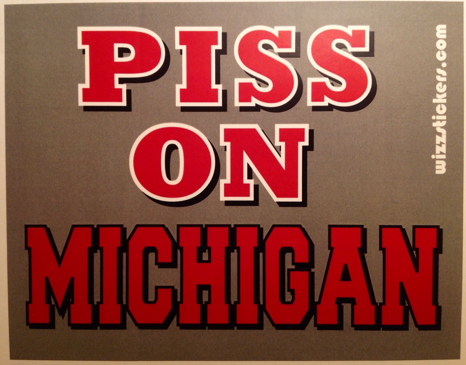 Piss on Michigan (Michigan Wolverines) Toilet Urinal Sticker by wizzstickers