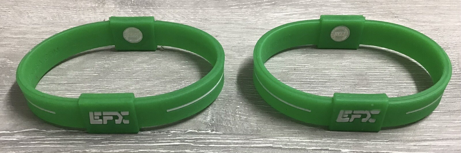 (LOT OF 2) EFX Hologram Silicon Balance Wristband Green/White - L - NEW - NO BOX