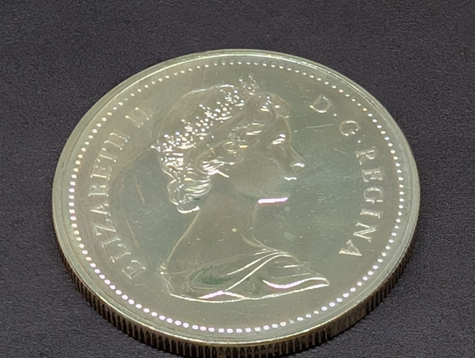 1973 Canada Silver Dollar $1 Toned Reverse 250430