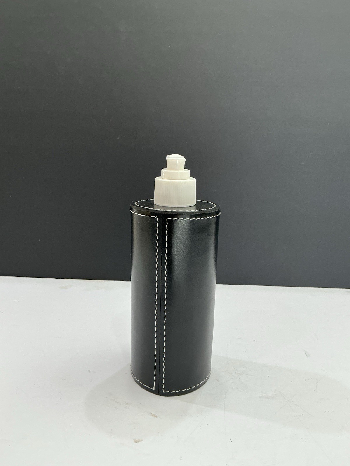 Black Leather Sleeve And Soap Dispenser